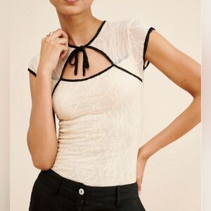 Mariposa Second Skin Lace Bow Tee in a sheer fabric with a keyhole neckline M